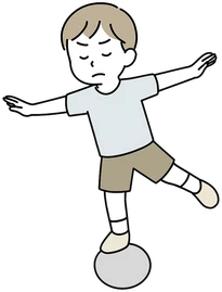 ボールの上でバランスをとる子どものイラスト